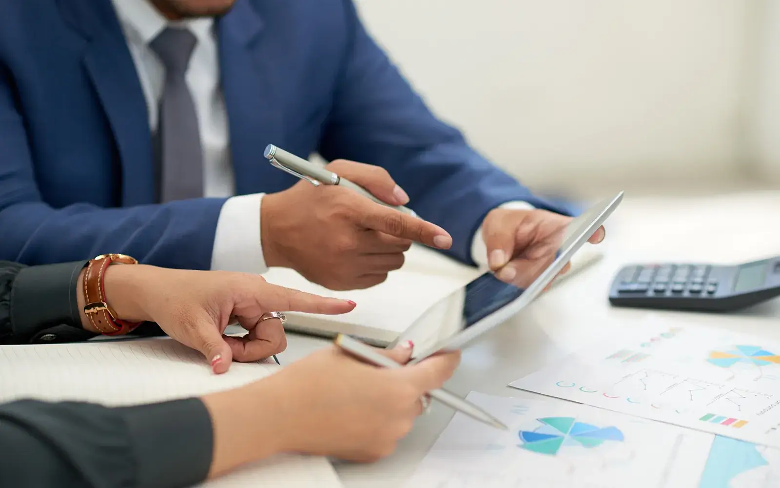 Image of two people looking at an tablet